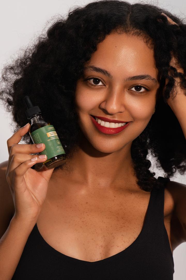 Crismyla fragrance and beauty products styled with soft gold reflections